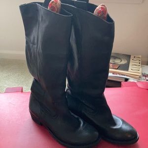 Woman’s black leather boots